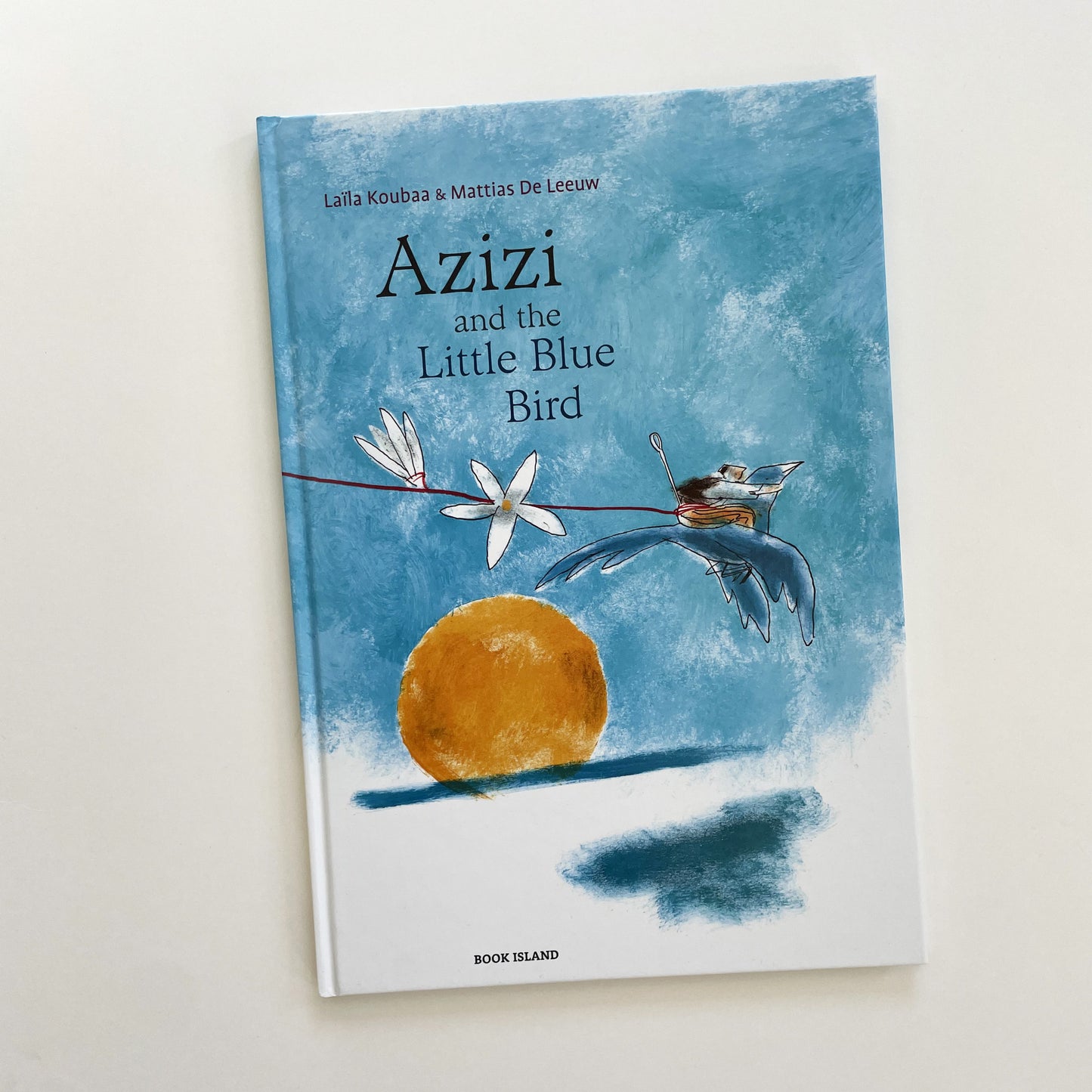 Azizi and the Little Blue Bird